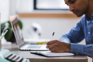 man wondering how to feel alive when working