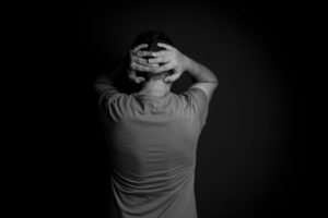 man experiencing depression and sadness