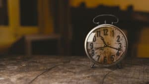 clock sitting on a desk