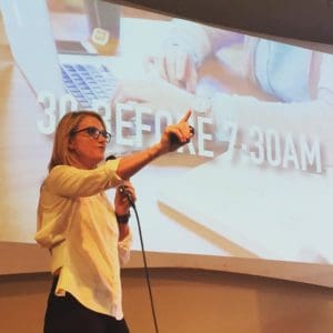 mel robbins speaking on stage