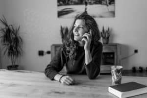 woman calling her friend and making today great