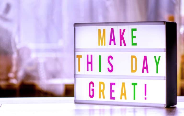 photo of a sign that says make today great