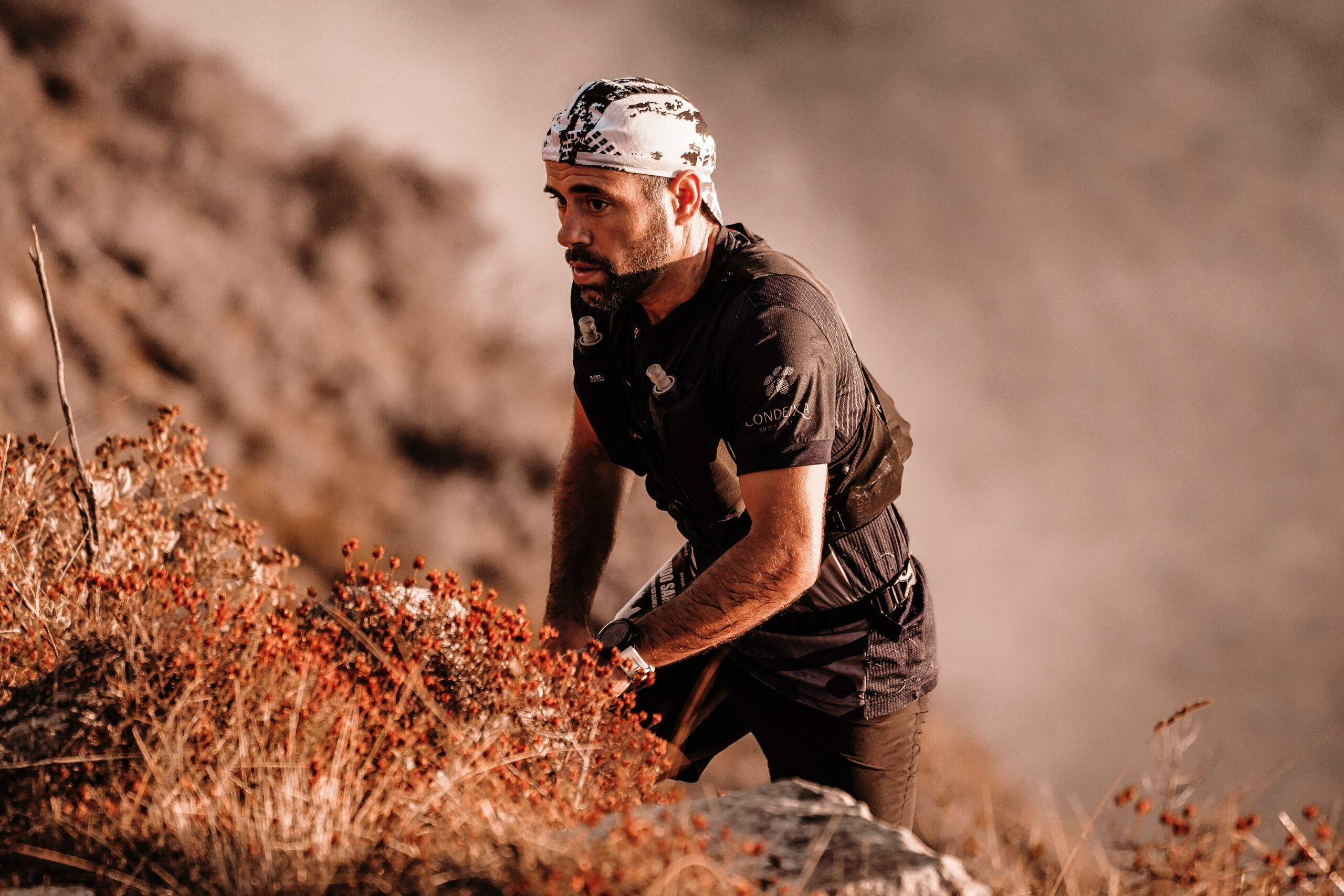man running up mountain
