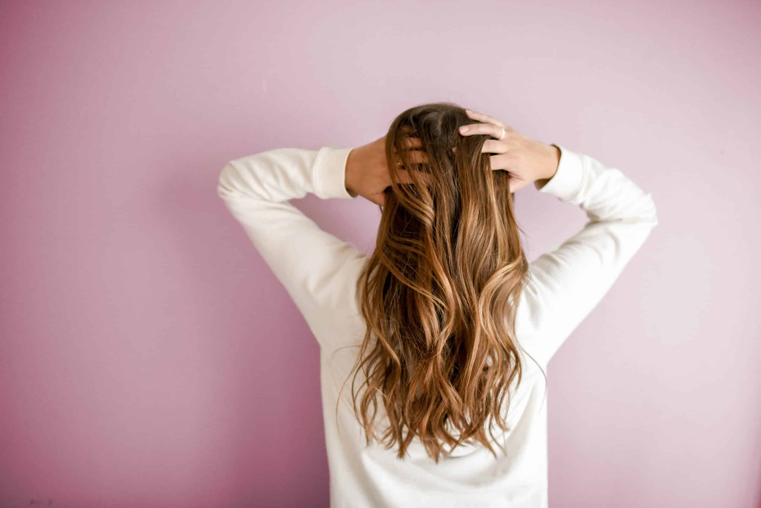 woman playing with her hair