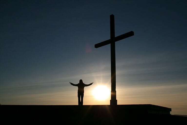 man praying to god