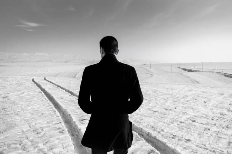 man walking on path