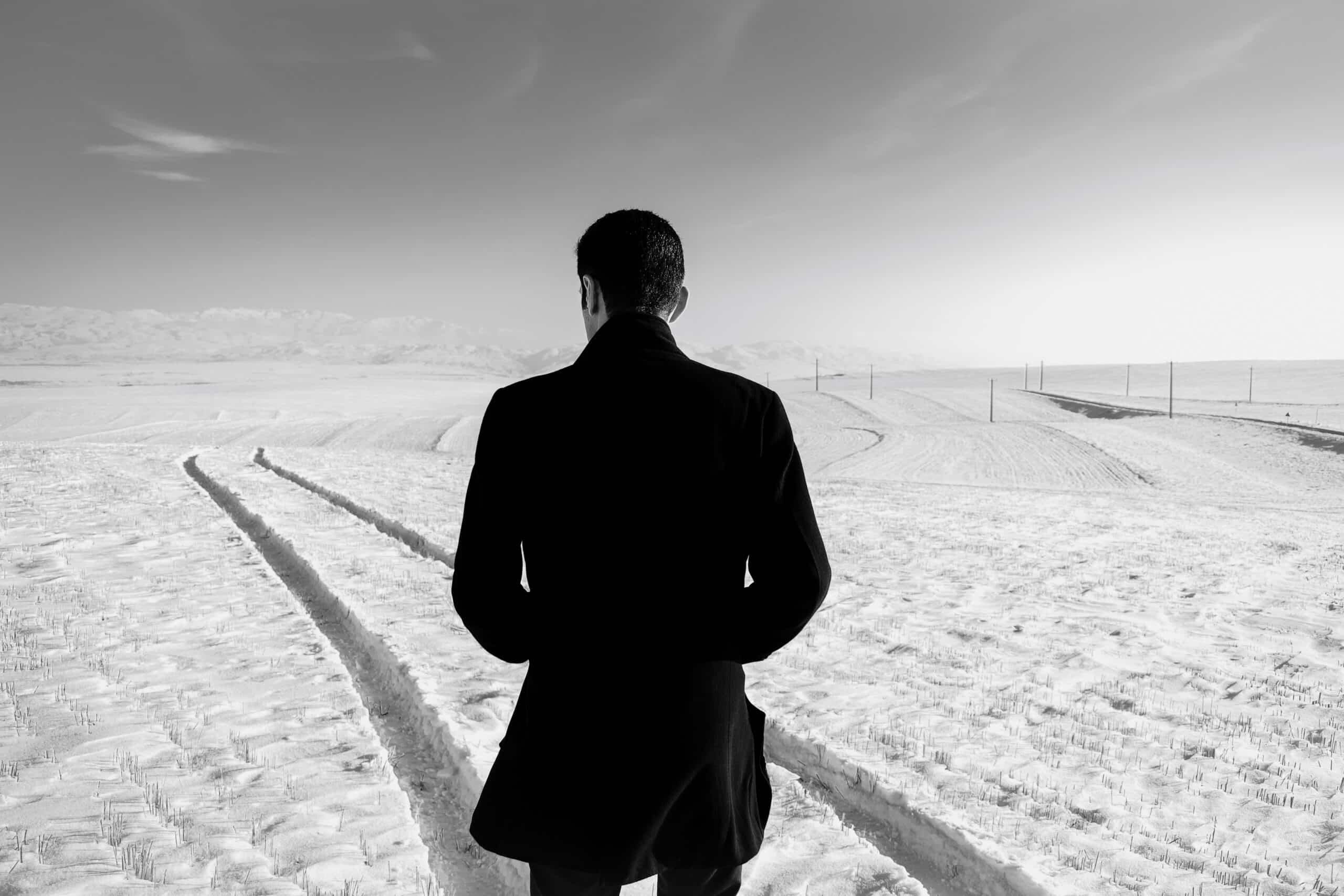 man walking on path