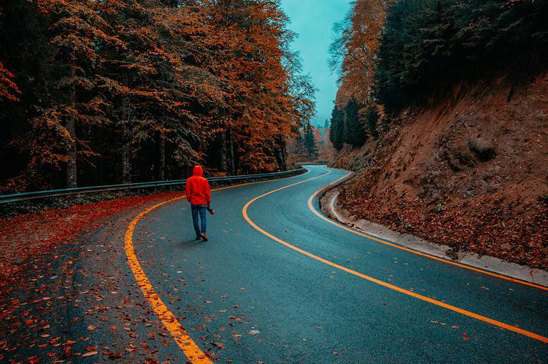 man walking on street