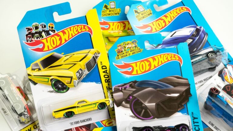 Pile of Hot Wheels cars in packaging.