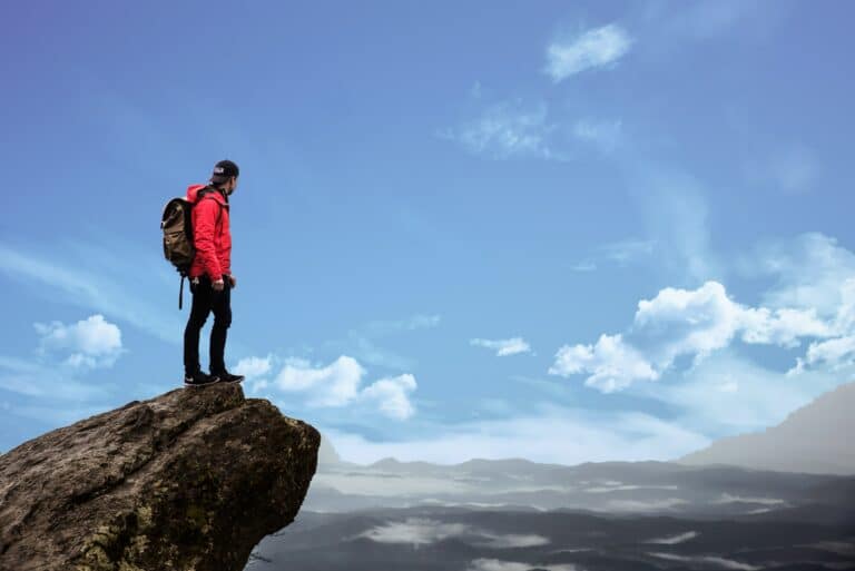 man standing on mountain