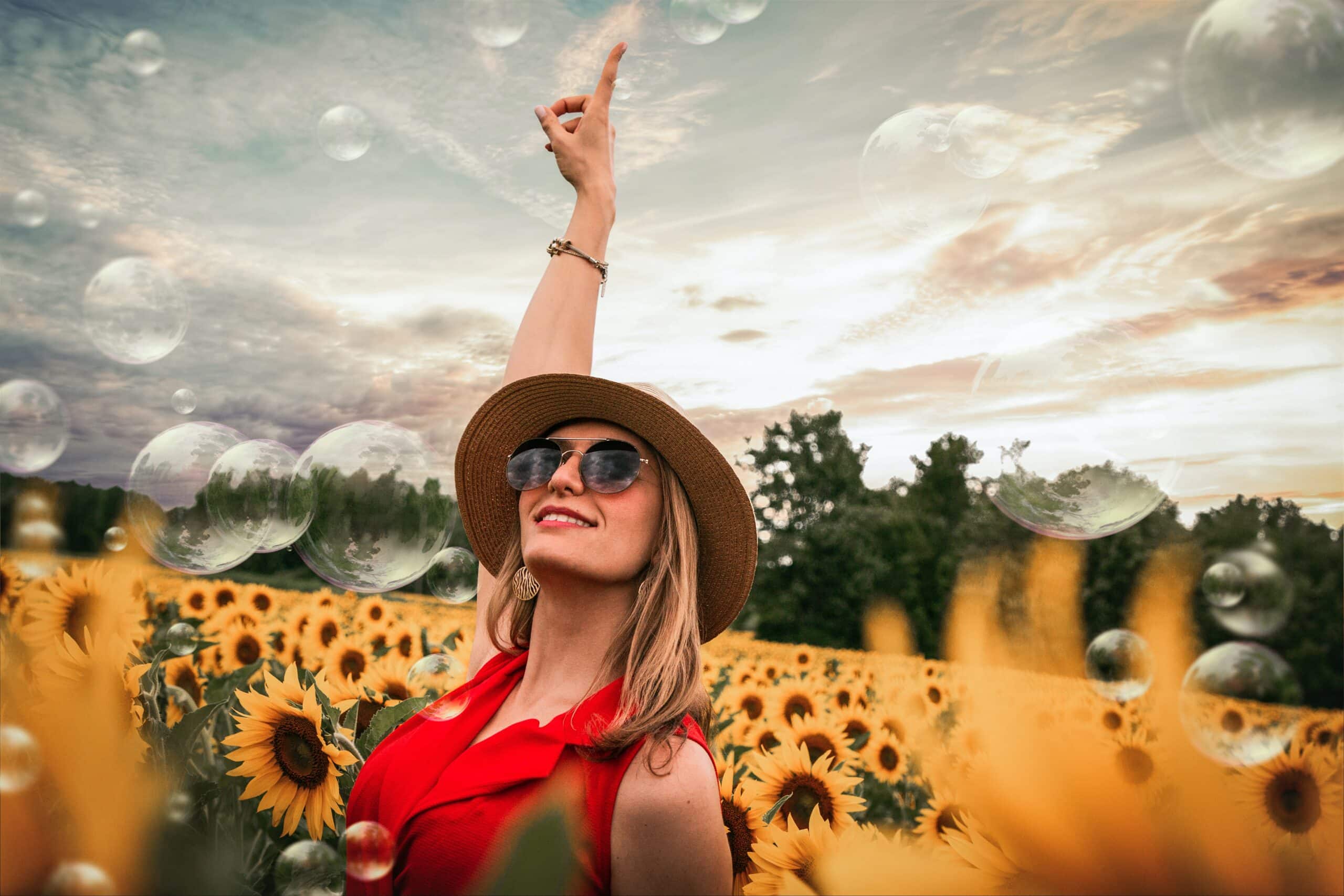 woman laughing in a field