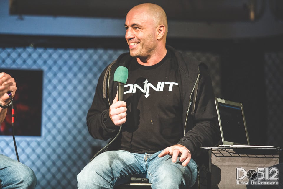 joe rogan speaking on stage