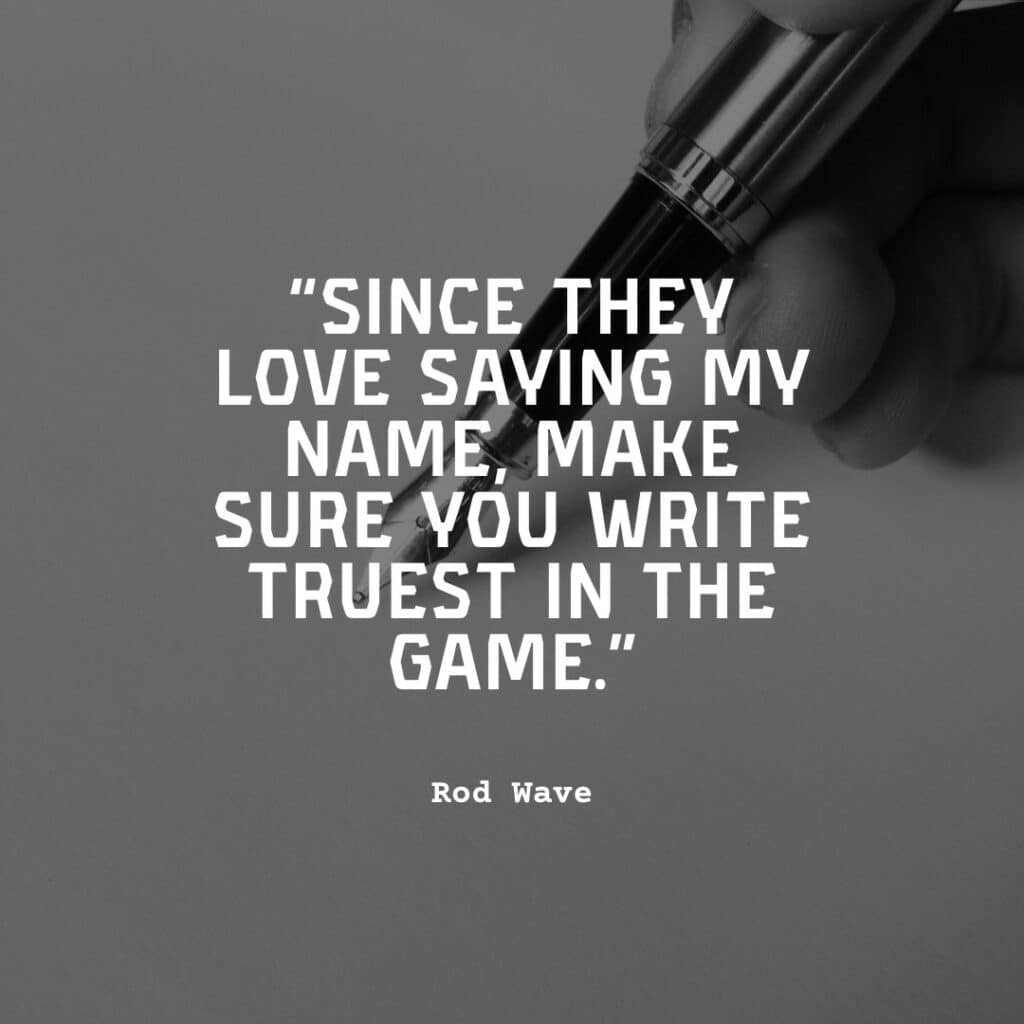 man writing on paper