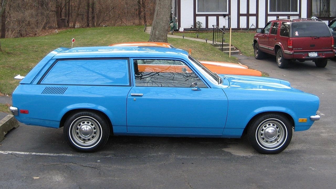 Side view of a 1971 Chevrolet Vega, blue.