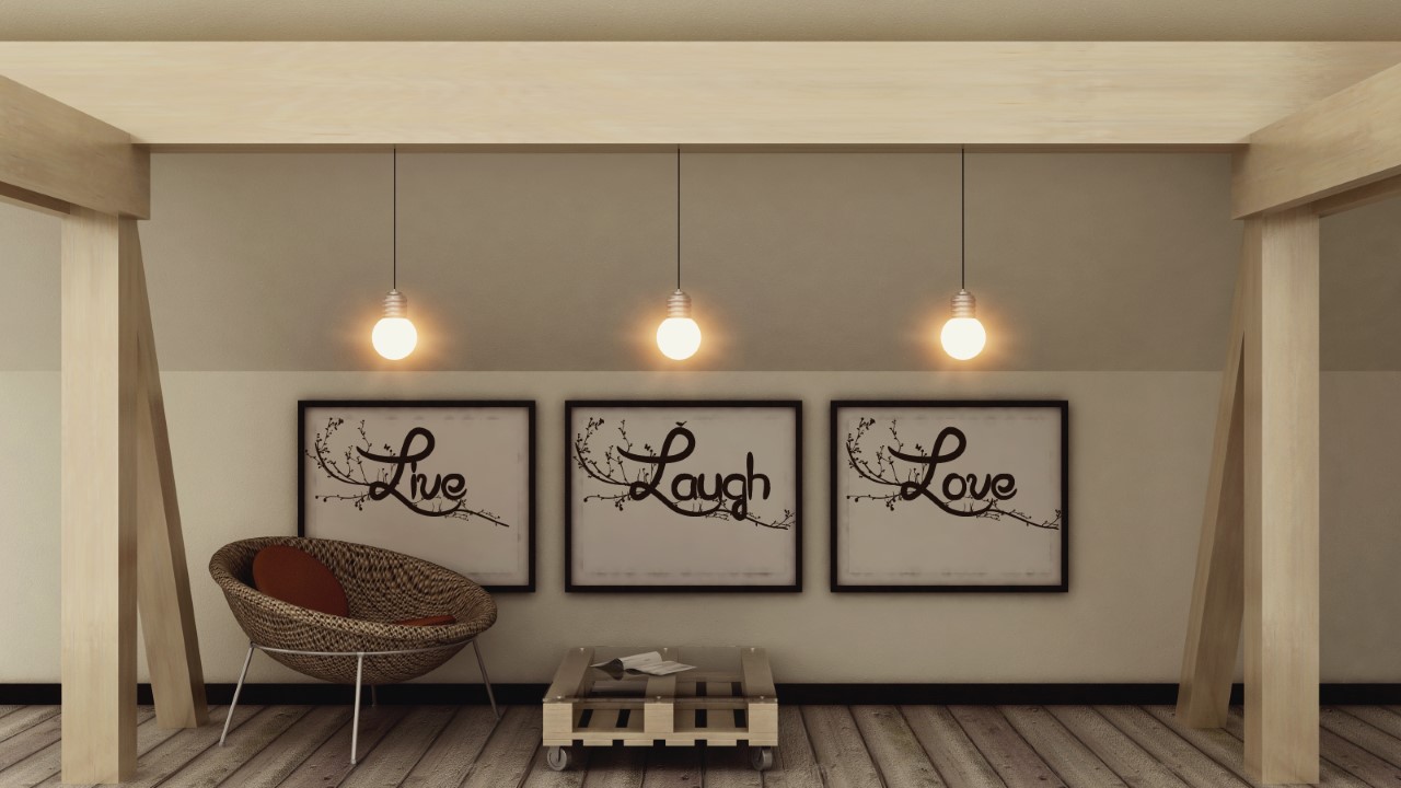 Large frames of "Live, Laugh, Love" portraits on the wall.