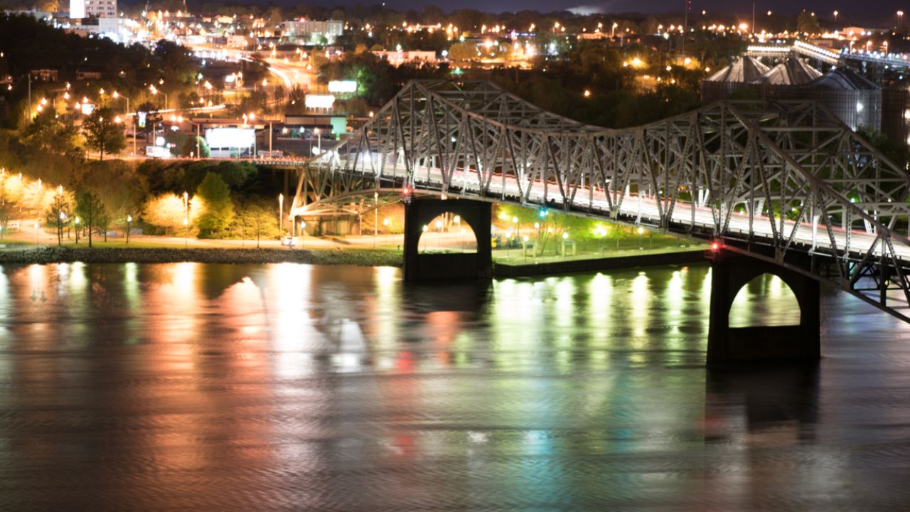 Overlooking the Tennessee River and Florence at night, long exposure, from Muscle Shoals Alabama - Traffic leaving trails and showing the vibrancy of the town