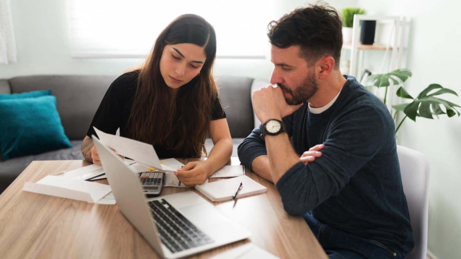 Couples discussing about monthly bills