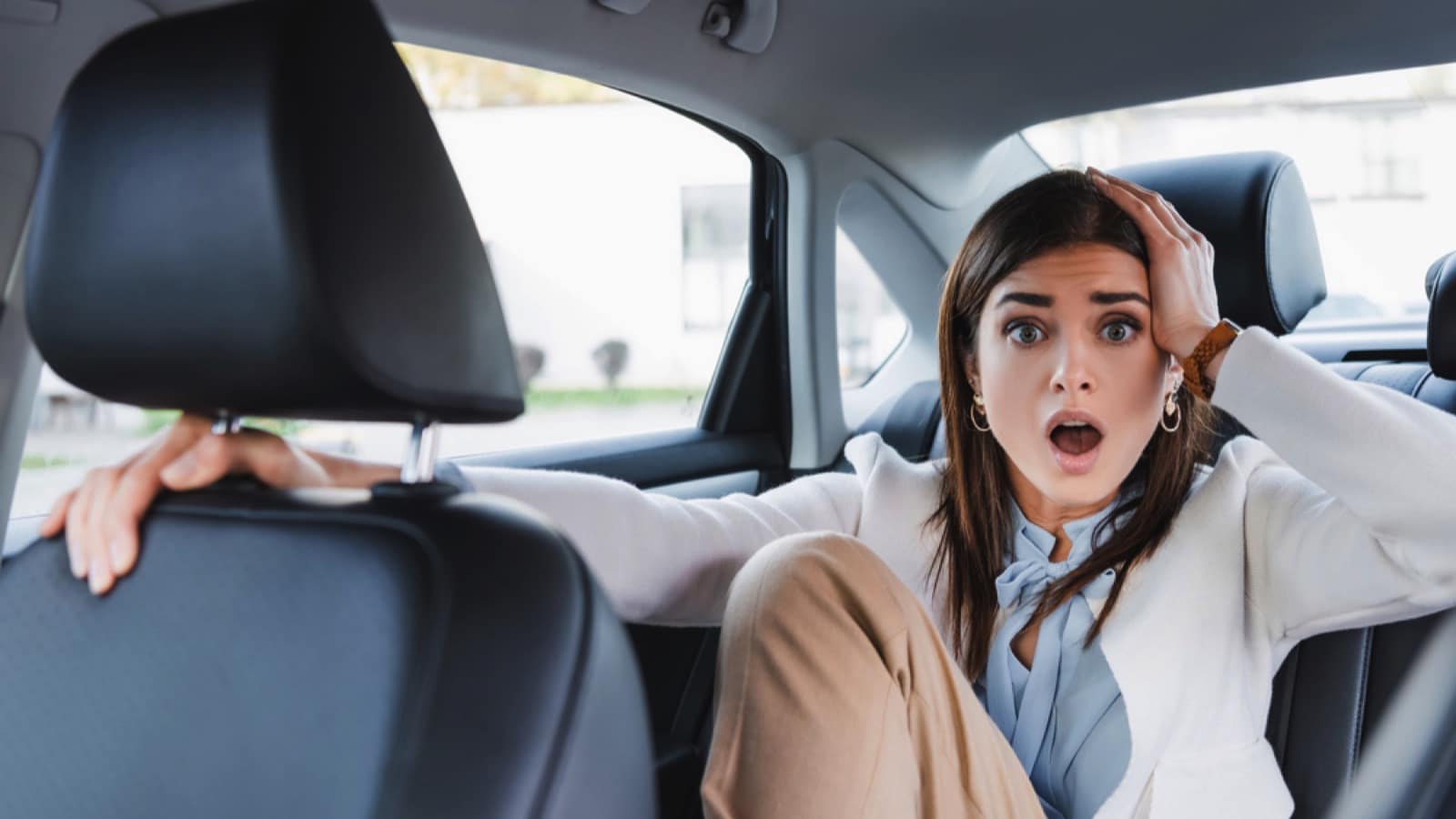 Scared woman in car