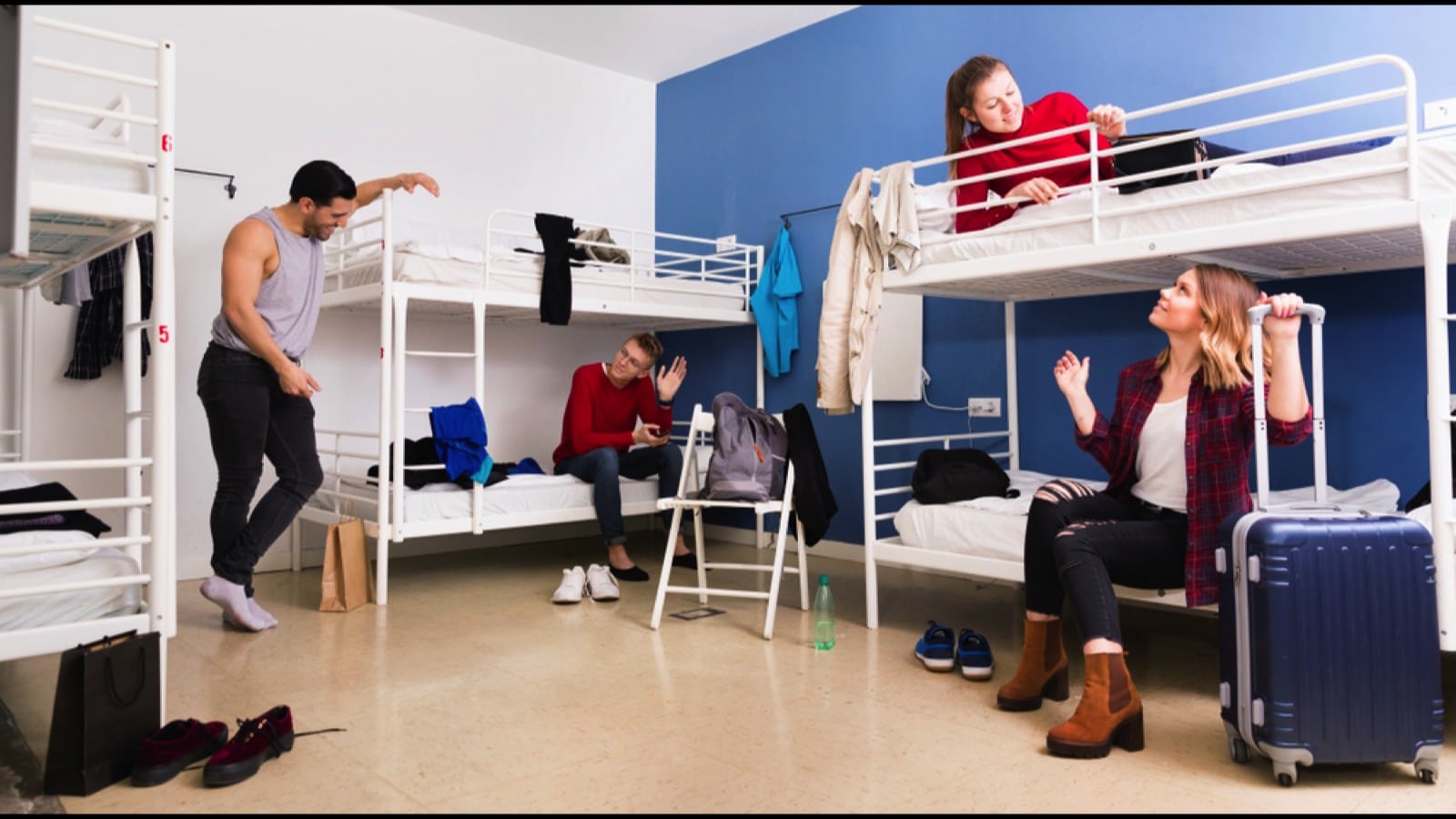 Travelers talking in room