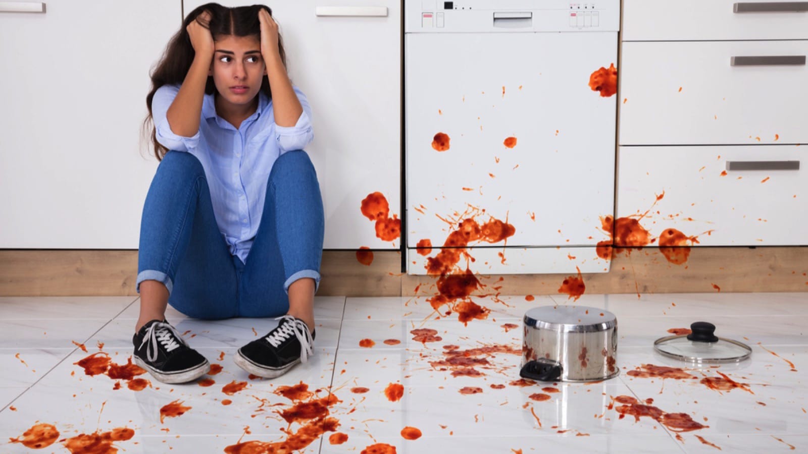 Woman dropping food on floor
