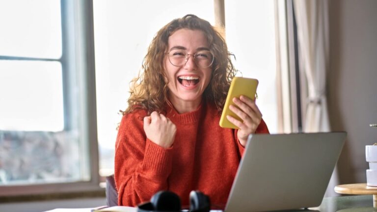 Woman excited after winning lottery