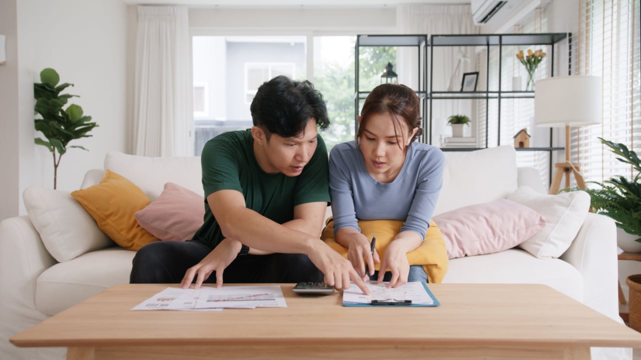 Couple carefully considering costs