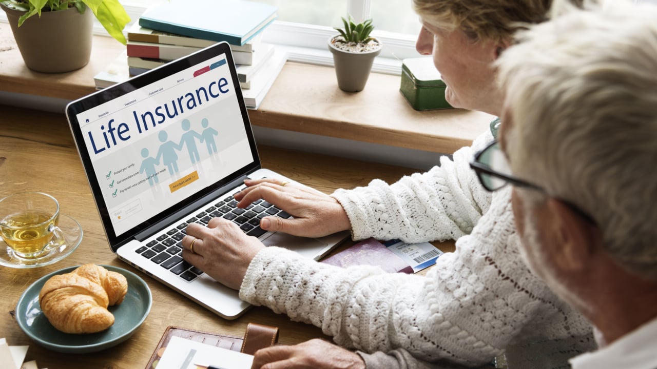 Woman looking into insurance policies and coverages