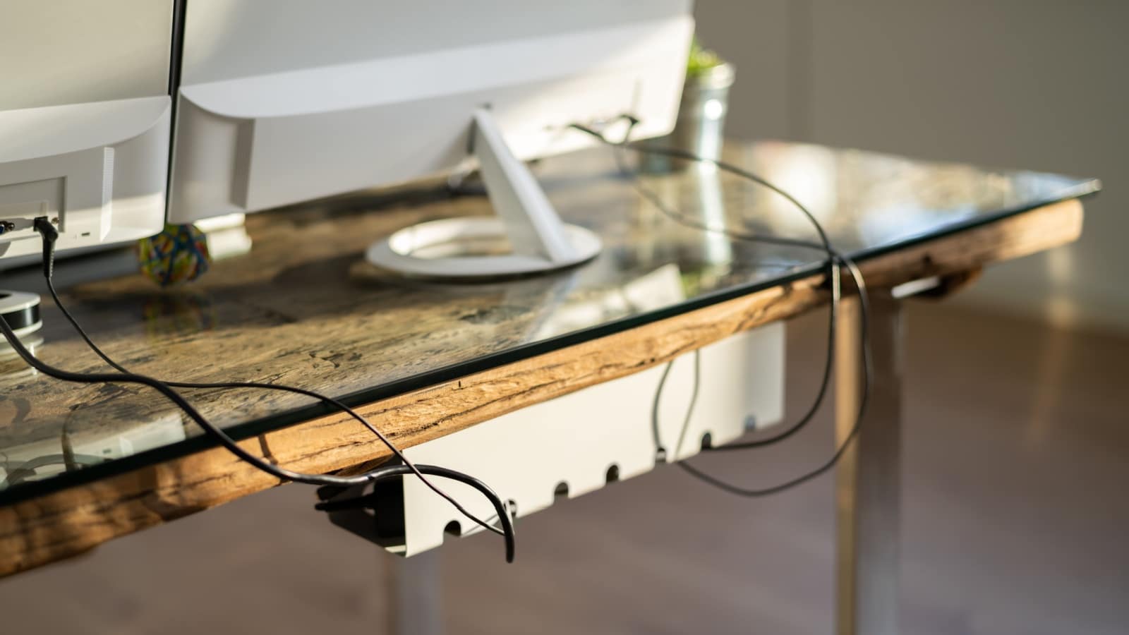 Cable cord organizer for desk management.