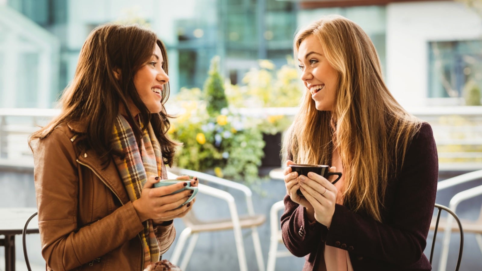 Friends talking over coffee.