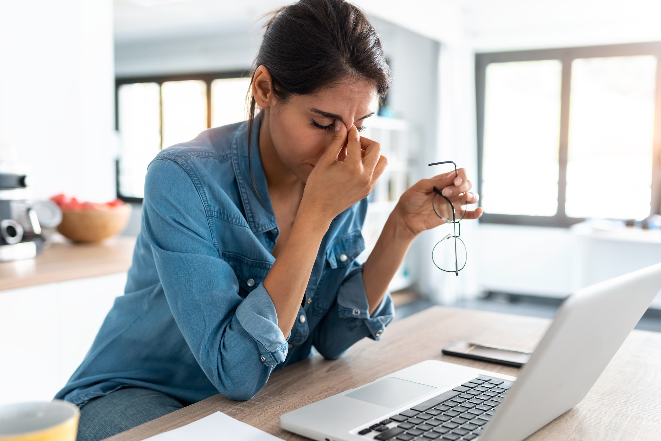 annoyed business woman at computer.