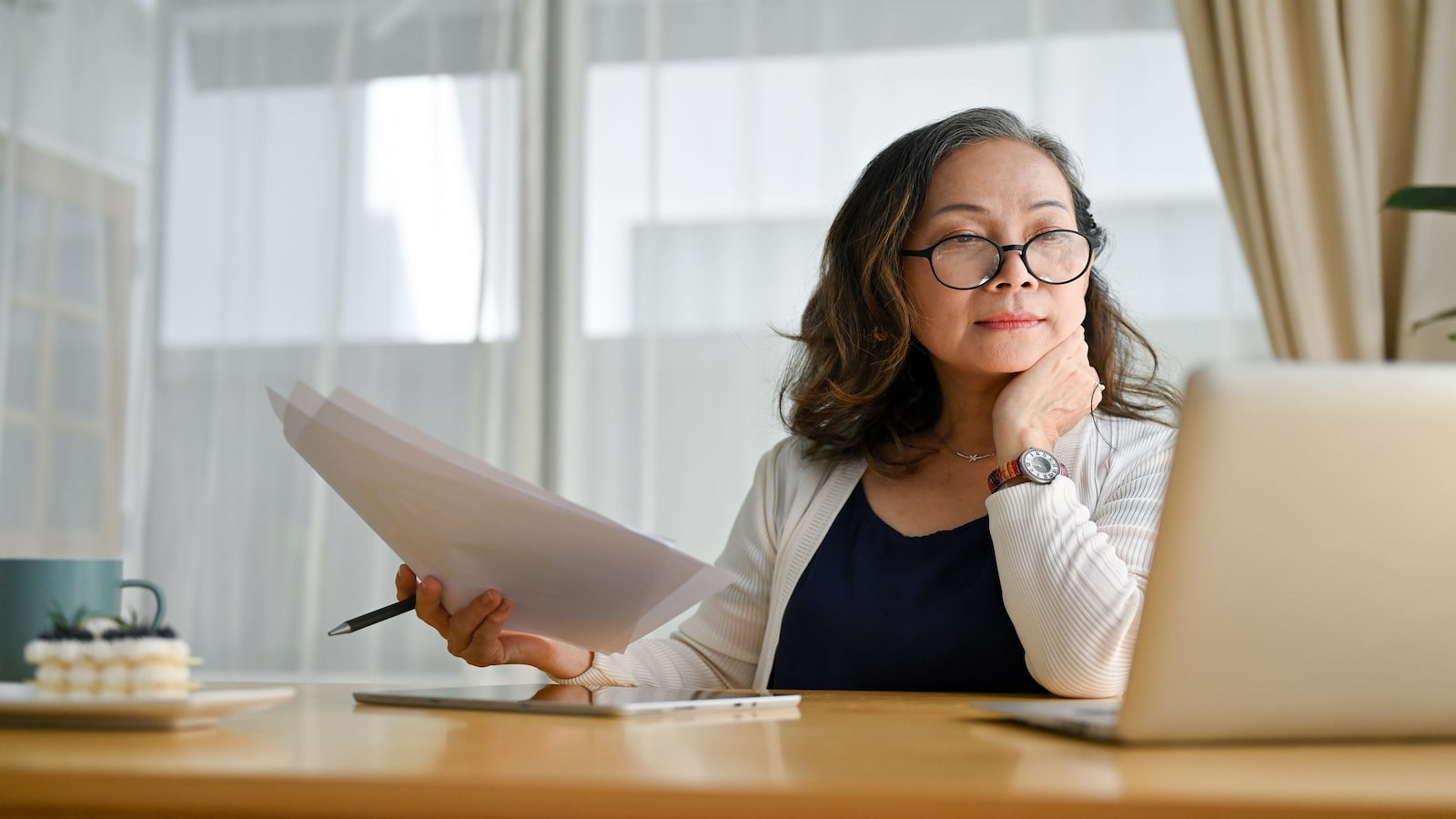 business woman concentrating and checking email on computer.