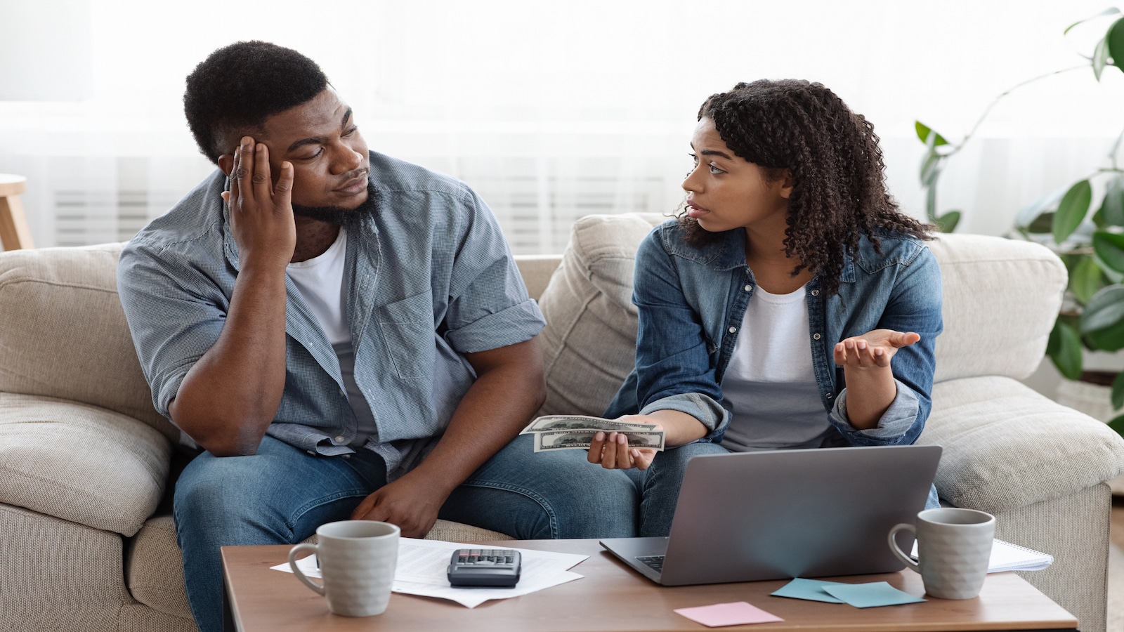 couple stressed about money.