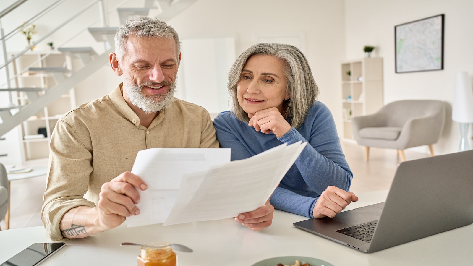 Couple looking at bills.