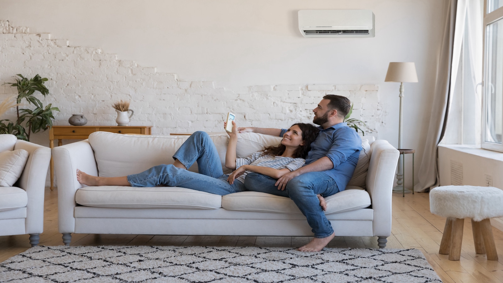 couple relaxing on couch.