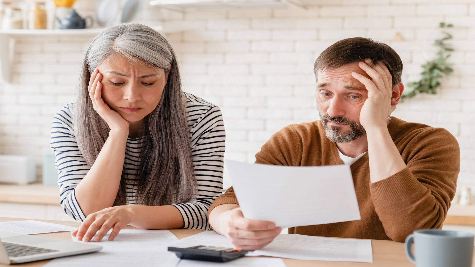 couple stressed about money.