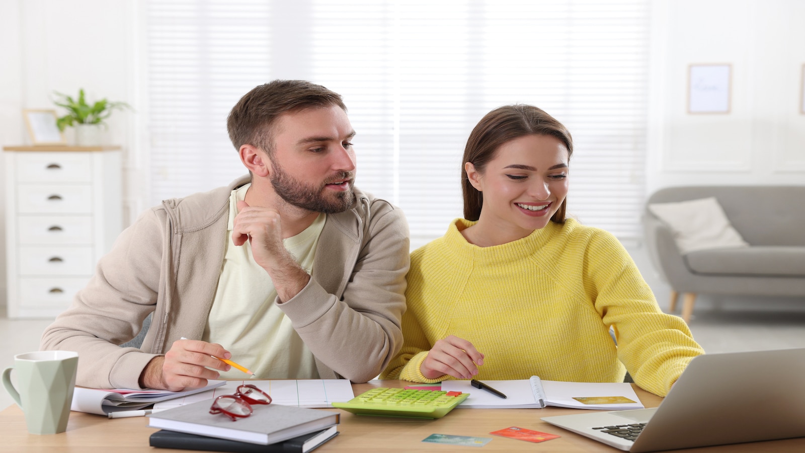 couple working on budget together.