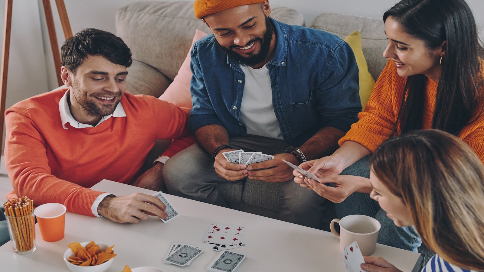 couples double date playing cards.