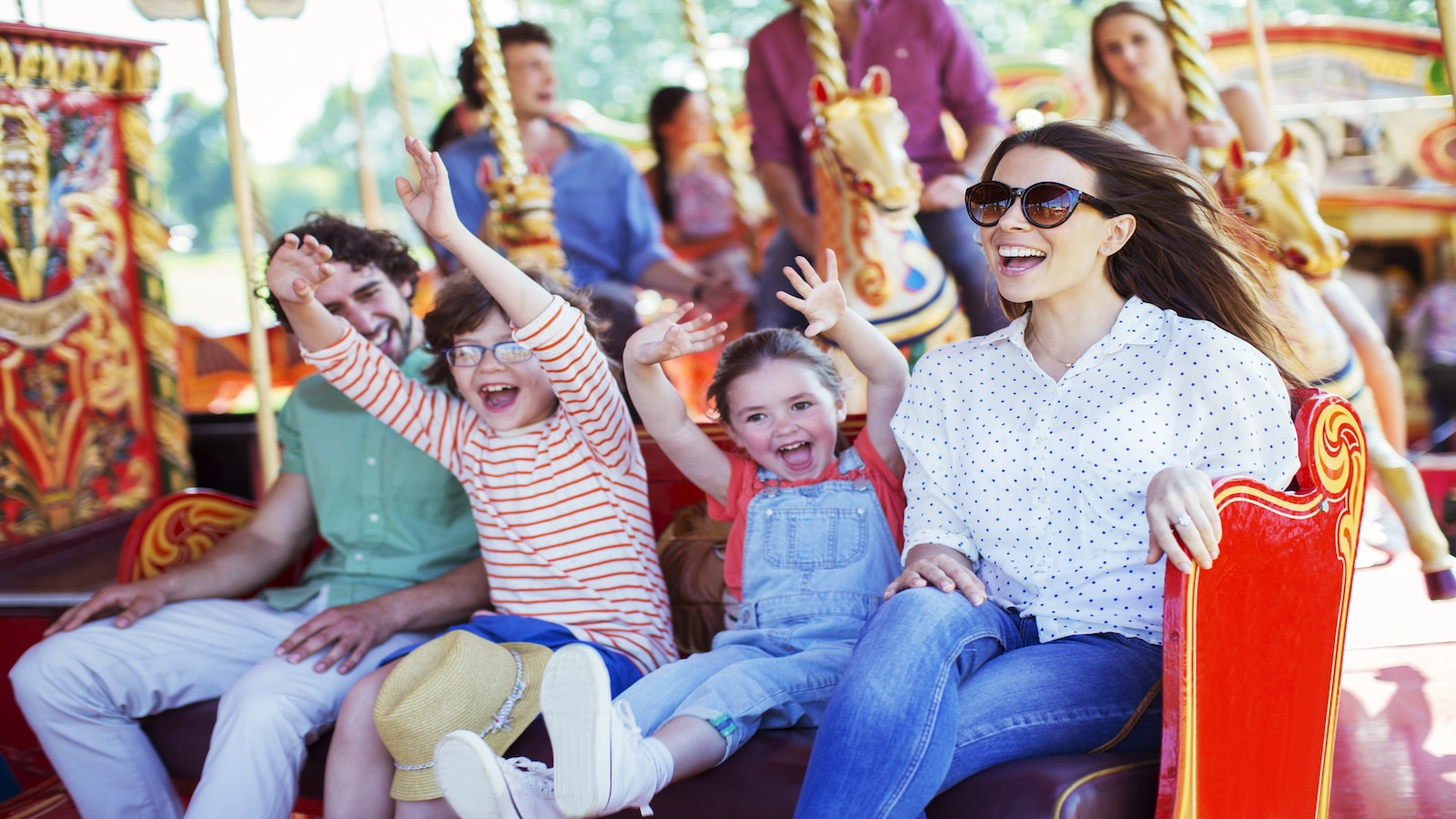 family at amusement park.