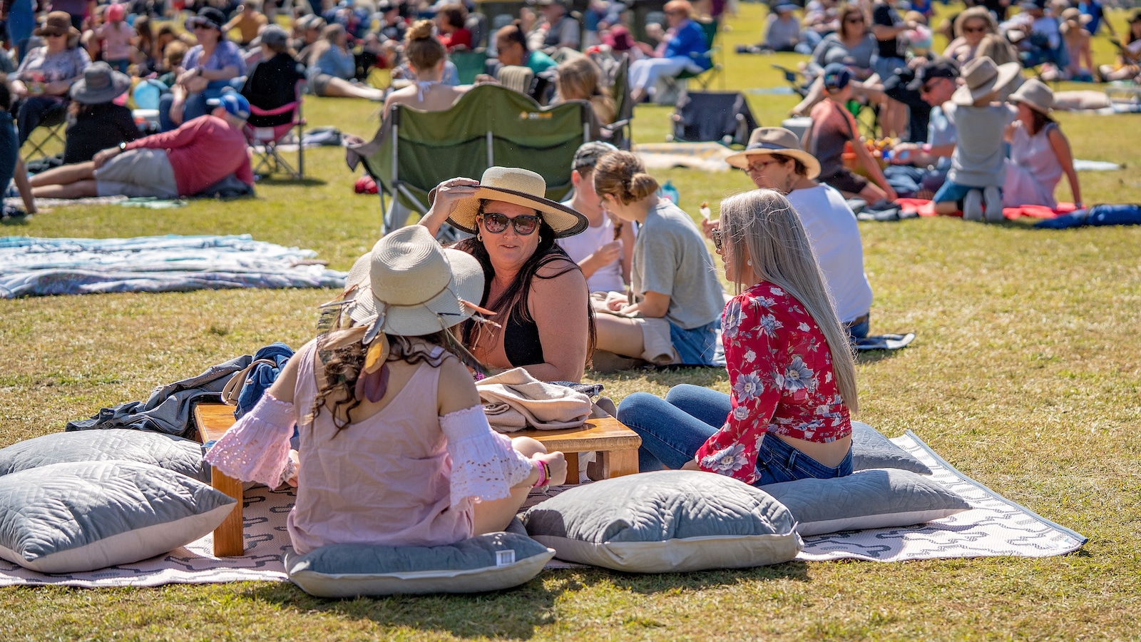 Friends Enjoying Outdoors At Food Festival.