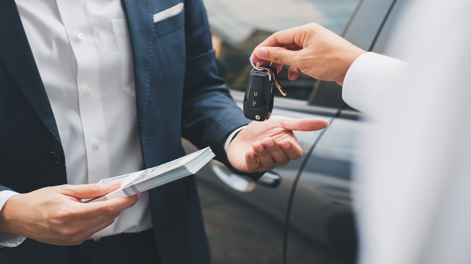 man buying a car.