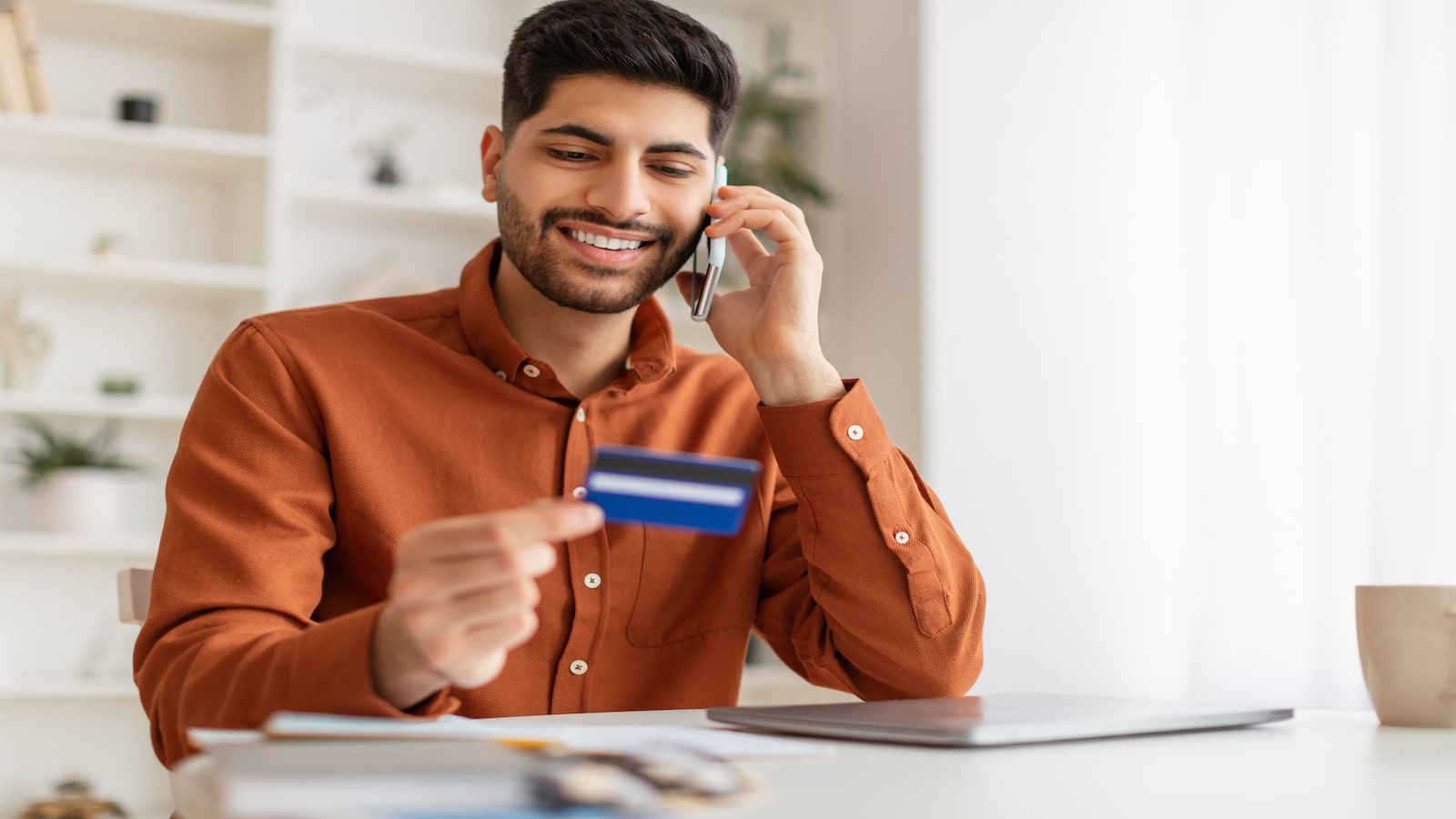 man on phone about credit card.