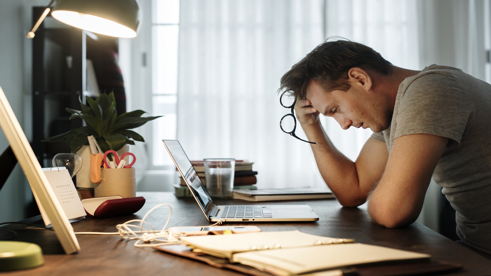 man stressed at computer