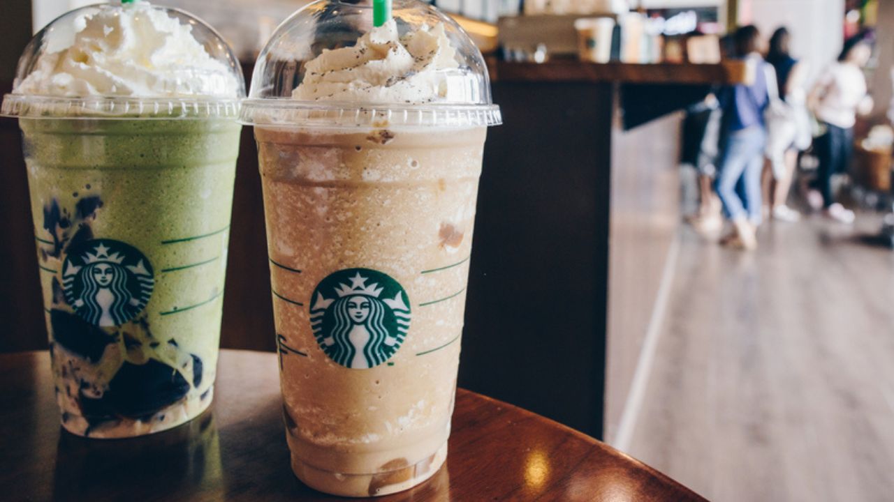 CHIANG RAI, THAILAND- July-02-2017 : A Venti Starbucks frappuccino Irish coffee and Green tea latte frappuccino in Starbucks coffee shop.