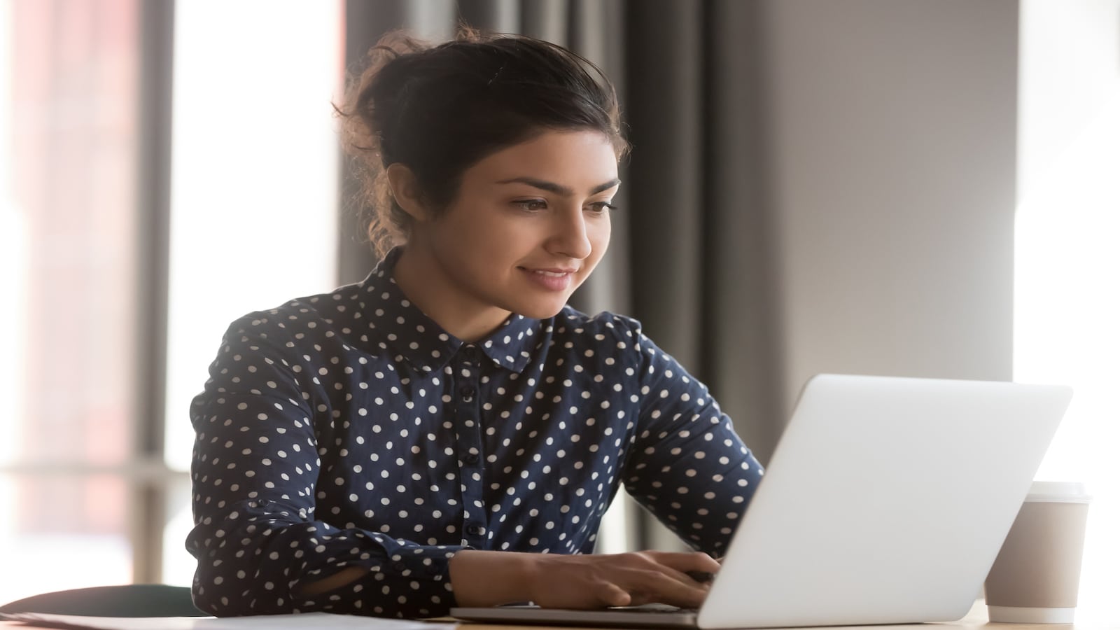 woman working at computer.