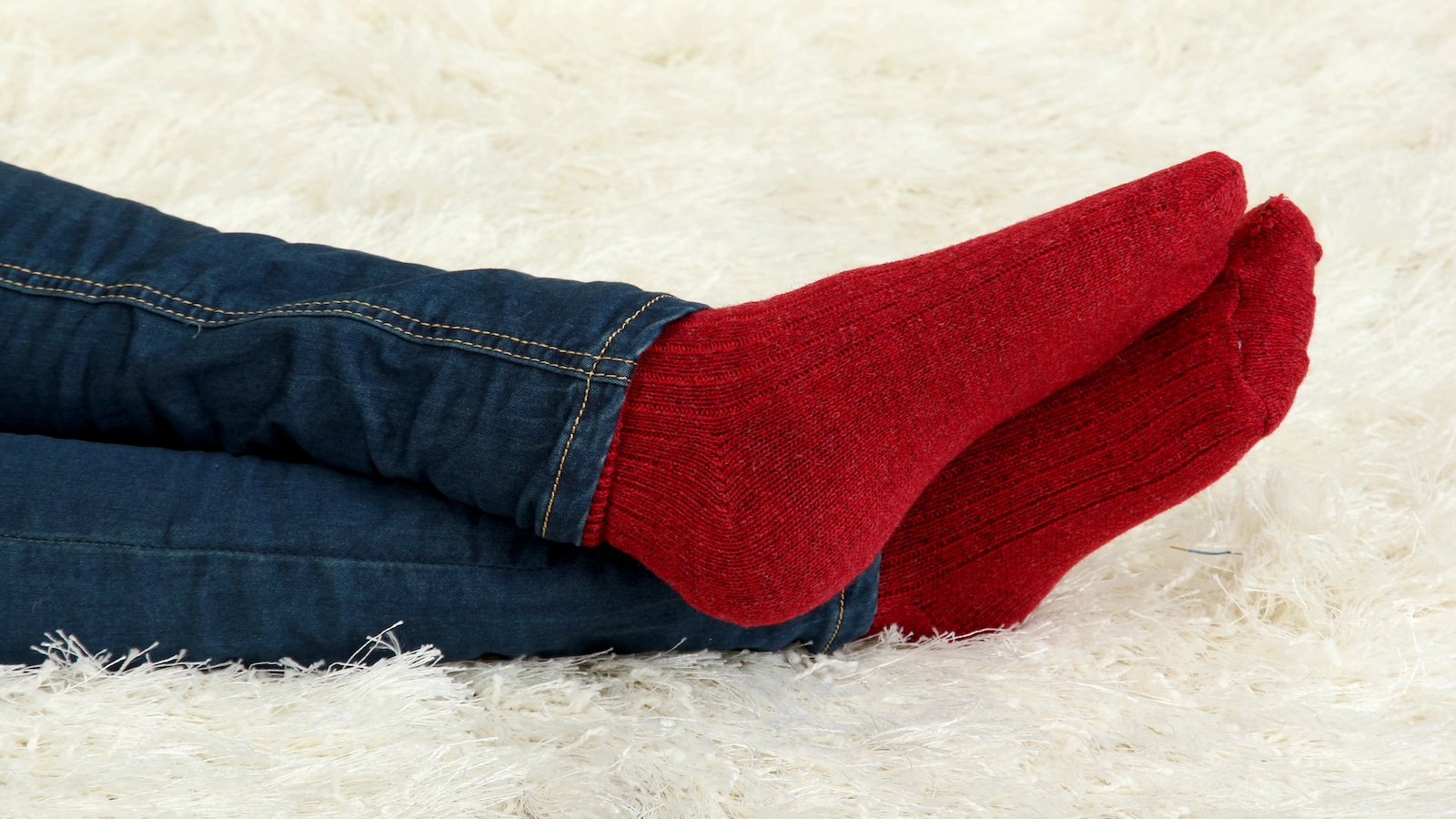 female legs with red socks.