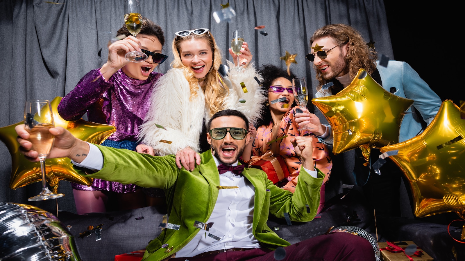 group of friends celebrating at party.