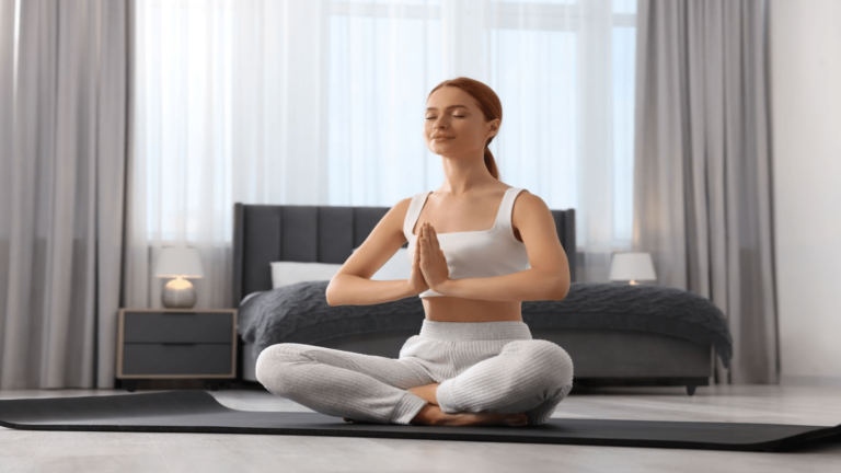 woman practicing yoga, doing upward facing dog exercise