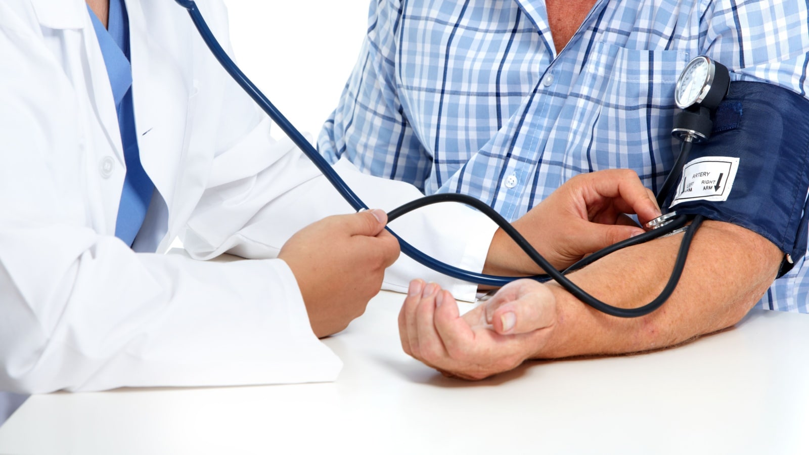 Doctor checking old man patient arterial blood pressure. Health care.