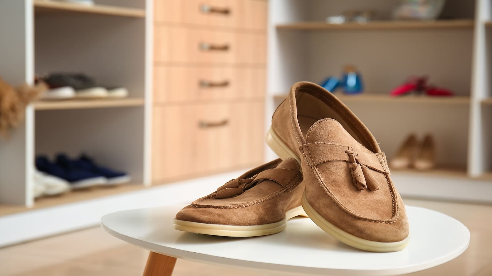 Shoes on table in closet.