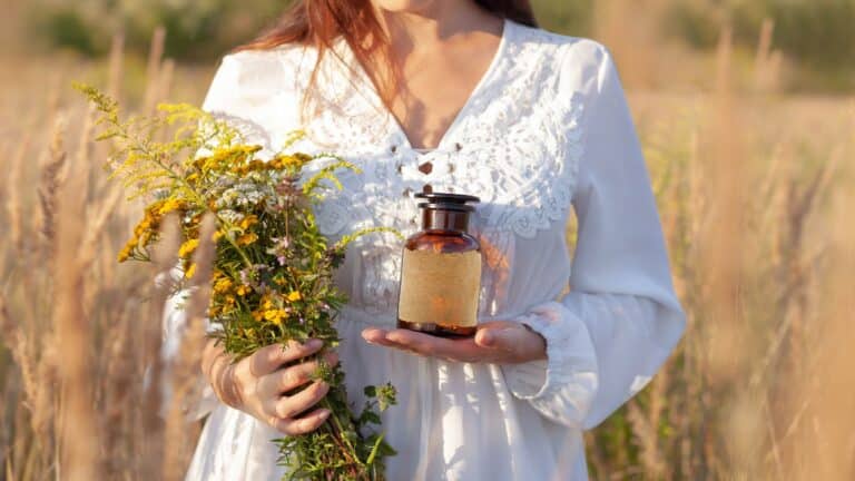 woman herbs field
